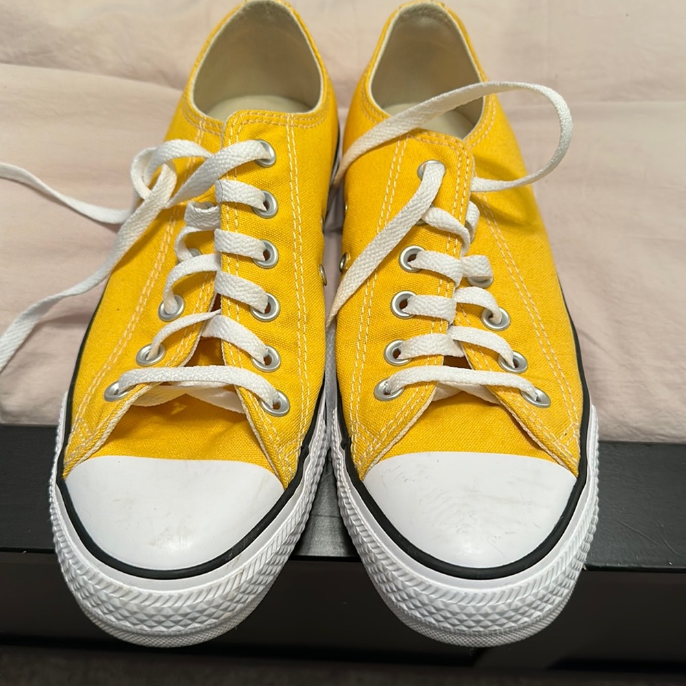 Nearly brand new bright yellow converse.